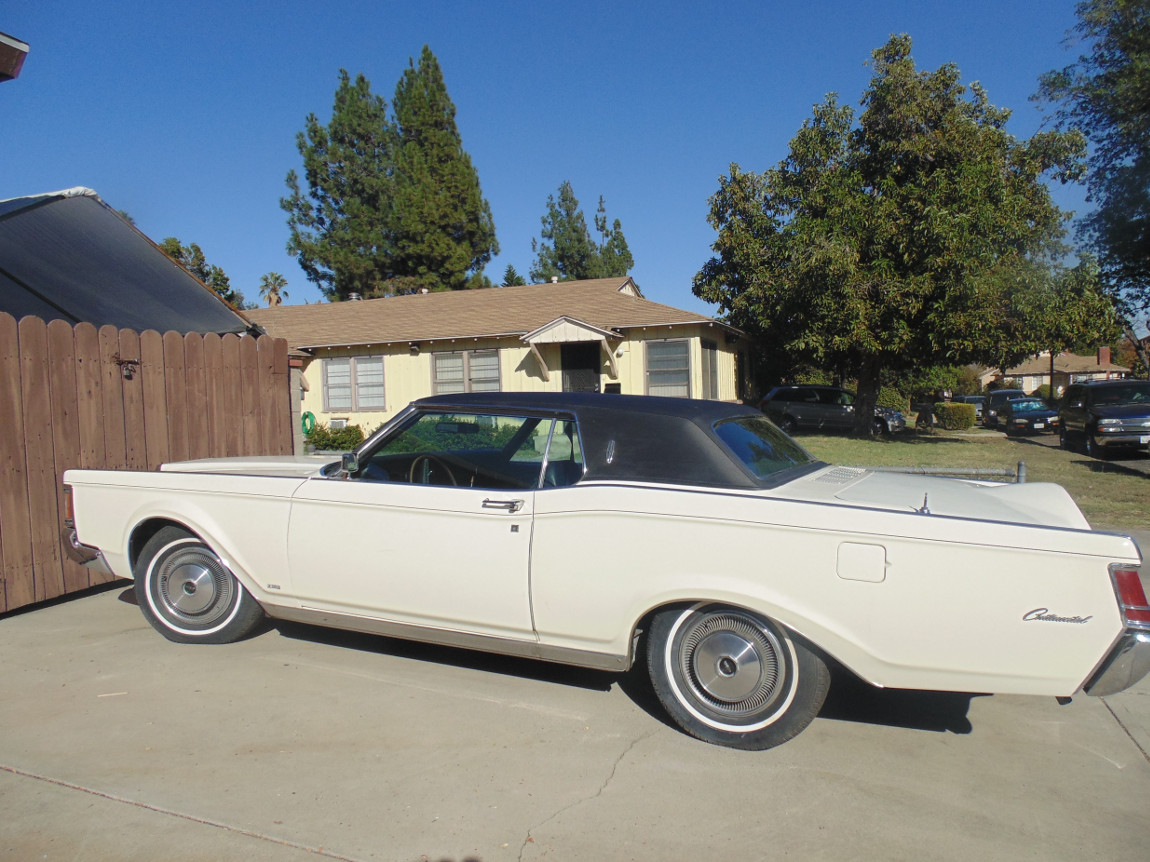 1970_Lincoln_Mark_III_Coupe_White_on_Black