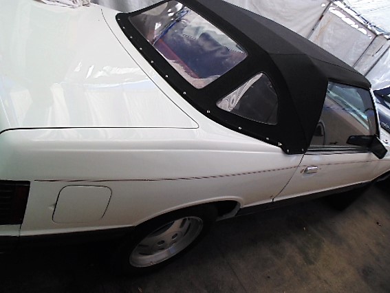 1979_Custom_Convertible_Mercury_Capri_White_Body_Black_Top